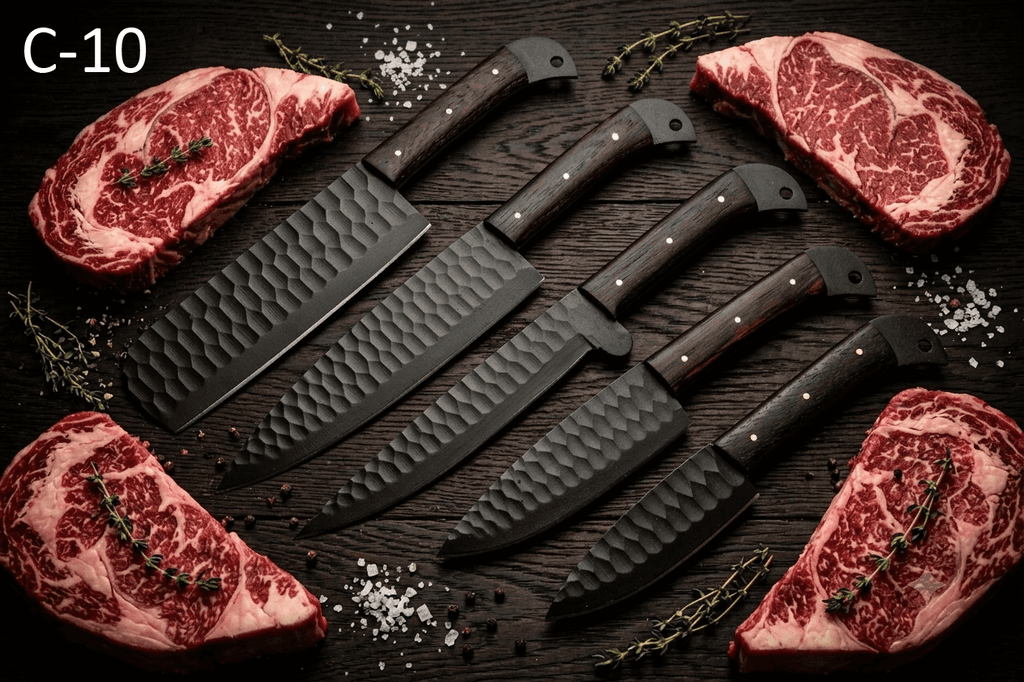 Set of black kitchen knives with wooden handles on a dark surface with raw meat.