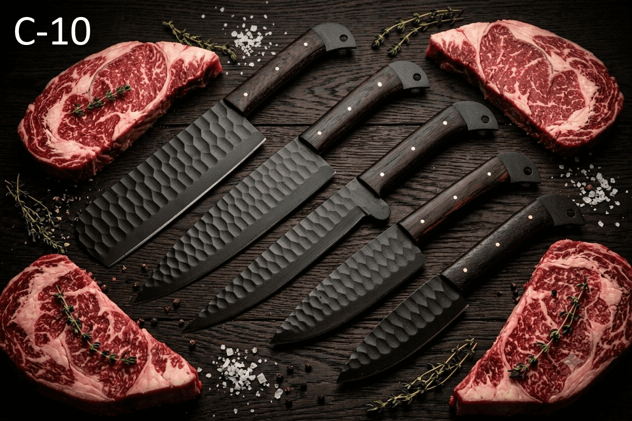 Set of black kitchen knives with wooden handles on a dark surface with raw meat.